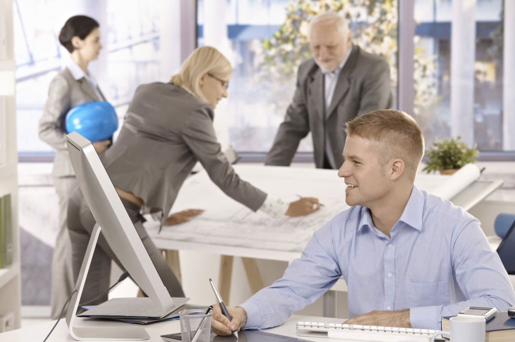 People working in an architecture office.