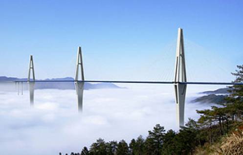 Above the clouds, China’s Pingtang Bridge towers, the tallest of which are1,076 ft high, will make the Pingtang Bridge one of the tallest in the world. (Image courtesy of Bentley Systems.)