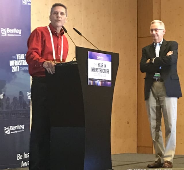 Chief Technology Officer Keith Bentley delivers the technology keynote at YII2017 in Singapore after a three-year absence. CEO Greg Bentley looks on.