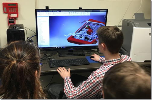 Students using Autodesk Inventor to design a robot.