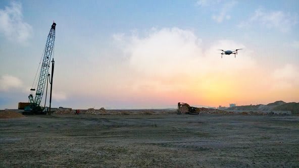 A quadrocopter drone flies over construction on Haifa’s “Gulf Port” area. (Image courtesy of Airobotics.)