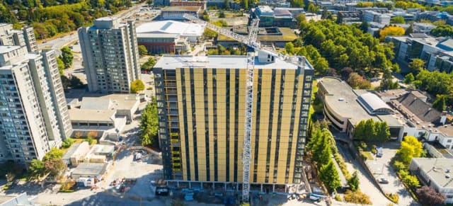 UBC’s newest residence, Brock Commons, is a steel/wood/concrete hybrid with 70 percent wood fiber cladding. Fire-suppressant wood company M-Fire wants to break into the growing market for tall wood buildings. (Image courtesy of UBC News.)
