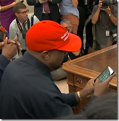Kanye unlocking his phone in front of media -ALL ZEROS!