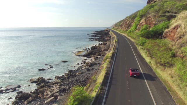 Hawaii has miles of scenic coastal roads. According to the ASCE’s report on infrastructure in Hawaii, those roads are one of the things most at risk due to sea level rise. (Image courtesy of Shutterstock.)