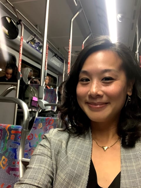 Tiffany Chu riding a bus in Detroit. Chu, who is the cofounder of Remix, an application that helps urban planners with the full mix of transportation options, does not own a car.